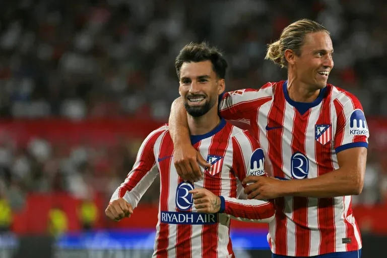 Atletico down Sevilla to go top of La Liga