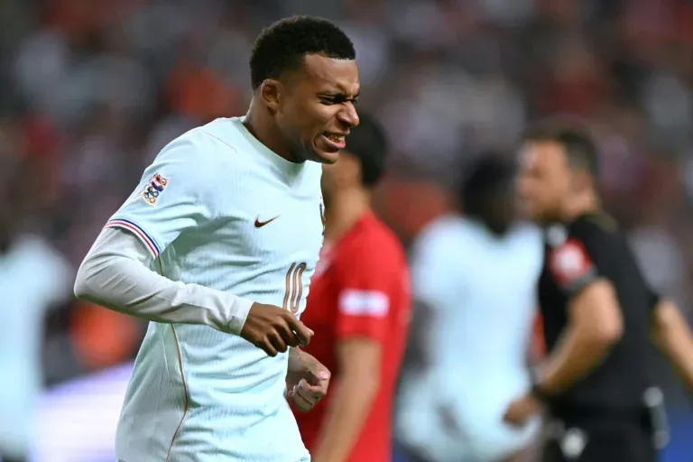 Mbappe scores but suffers knee injury as Zidane gets debut France win