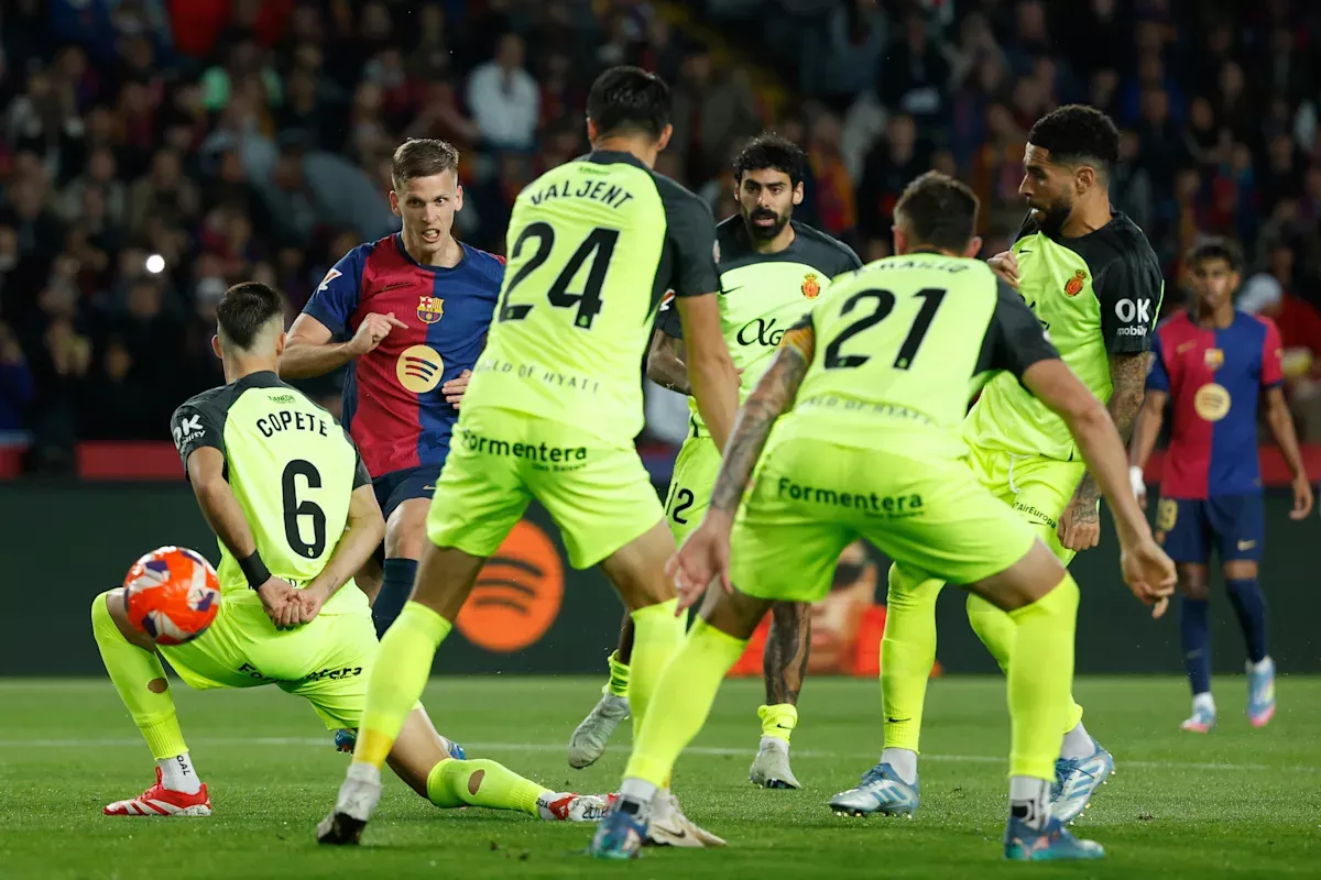 Barcelona increases Spanish league lead by beating Mallorca 1-0 on Dani Olmo's goal